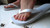 Elizabeth's White Flip Flops